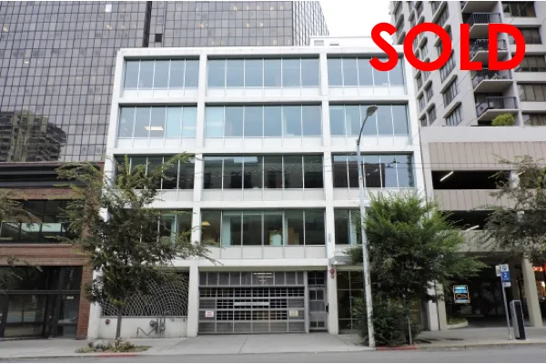 Exterior of 2112 Third Avenue with the original sold overlay