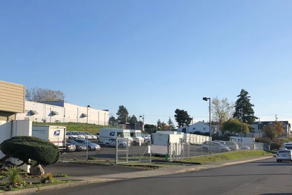Fenced vehicle yard shown for 3831 South Puget Sound Avenue