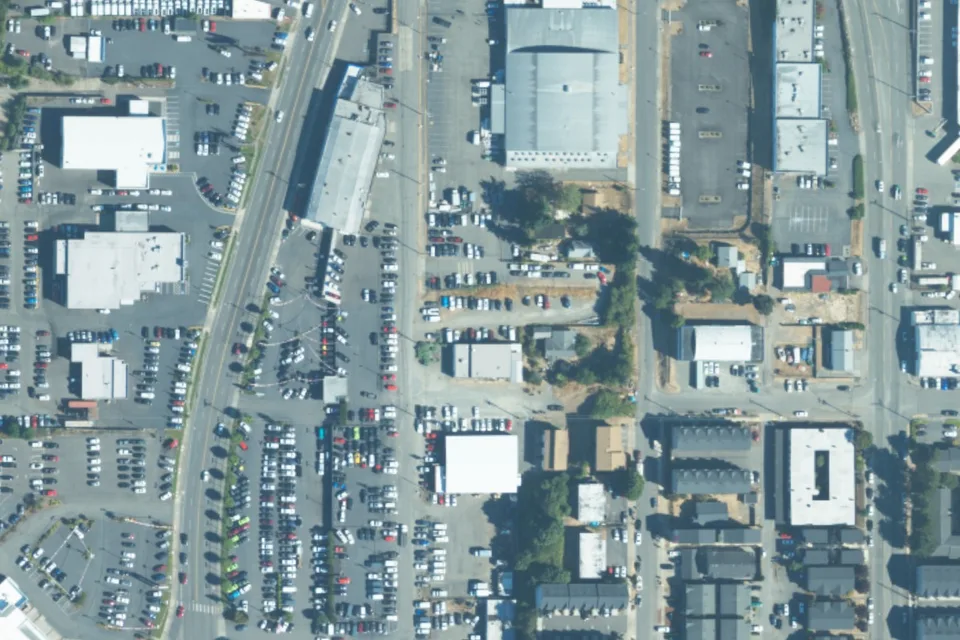 August 2023 aerial view around 3843 South Union Ave, with a green pin locating the vehicle lot